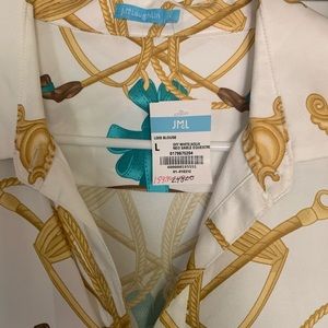 Very elegant yet classic.  Beautiful with a pair of ivory dress pants, or skirt